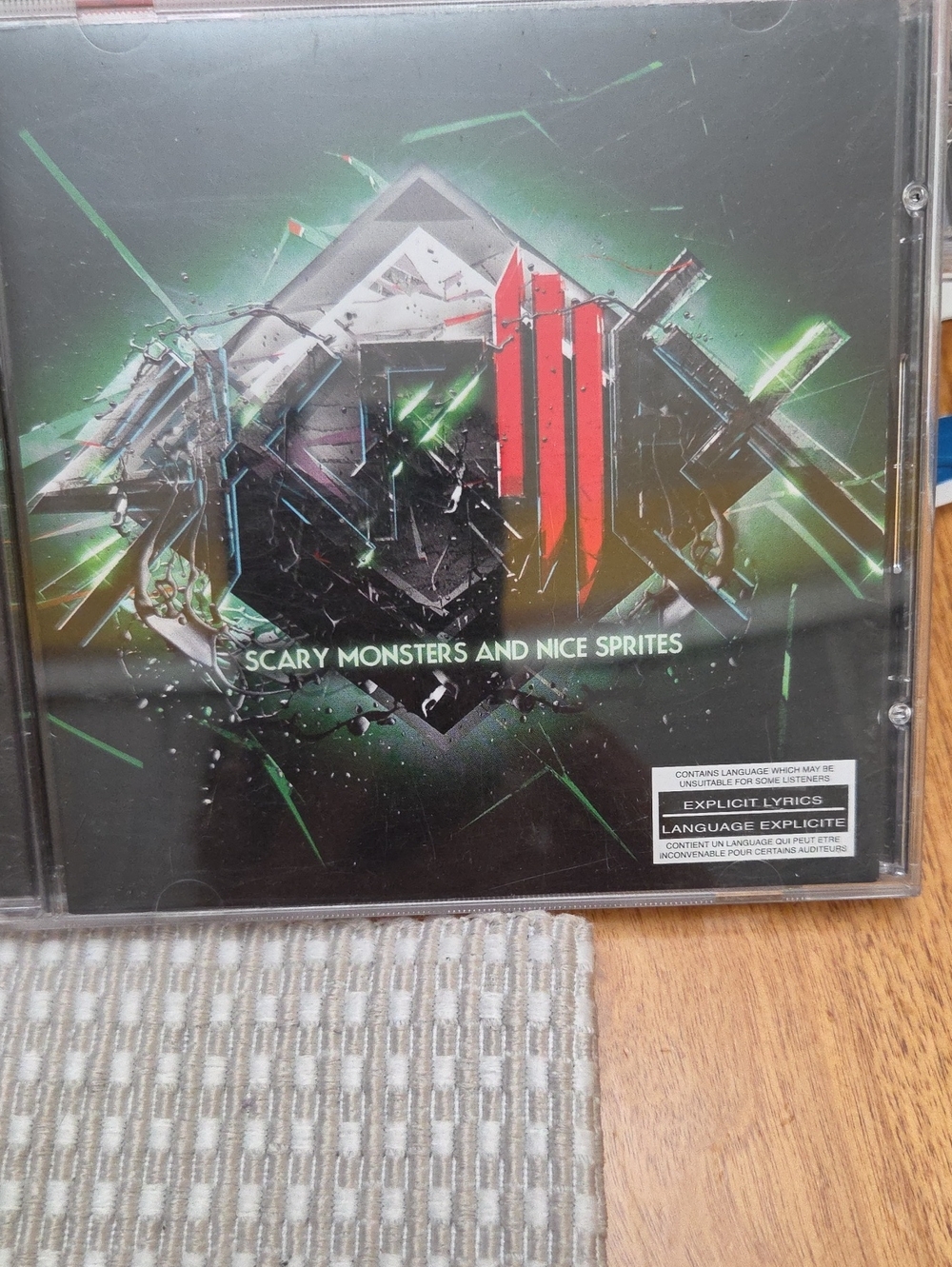 Scary Monsters and Nice Sprites CD – Black/Green Artwork